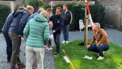 Enthousiaste deelnemers aan workshop archeologie
